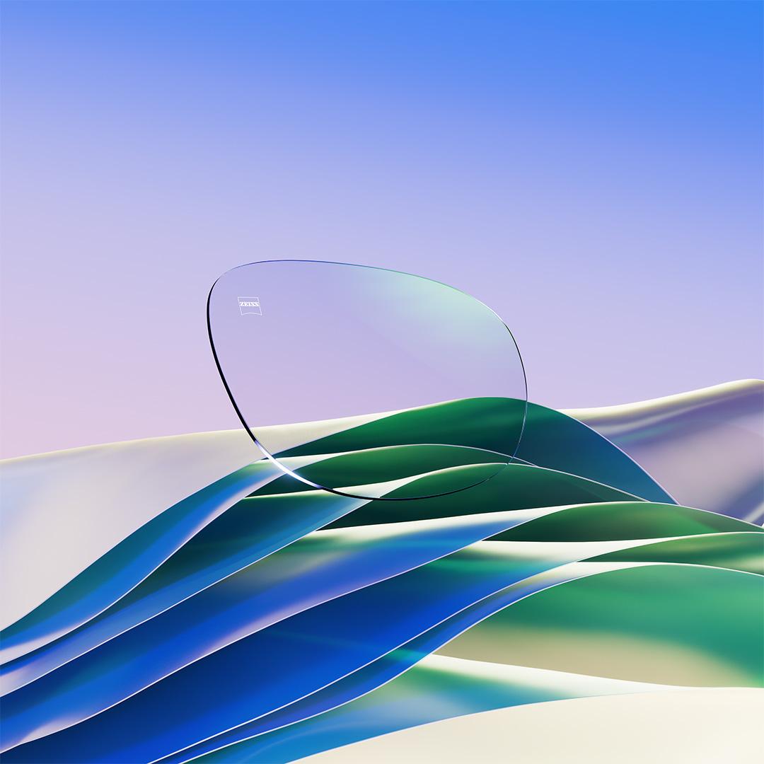 A ZEISS DuraVision Chrome UV rétegről készült kép, amelyen zöldes tükröződés látható.