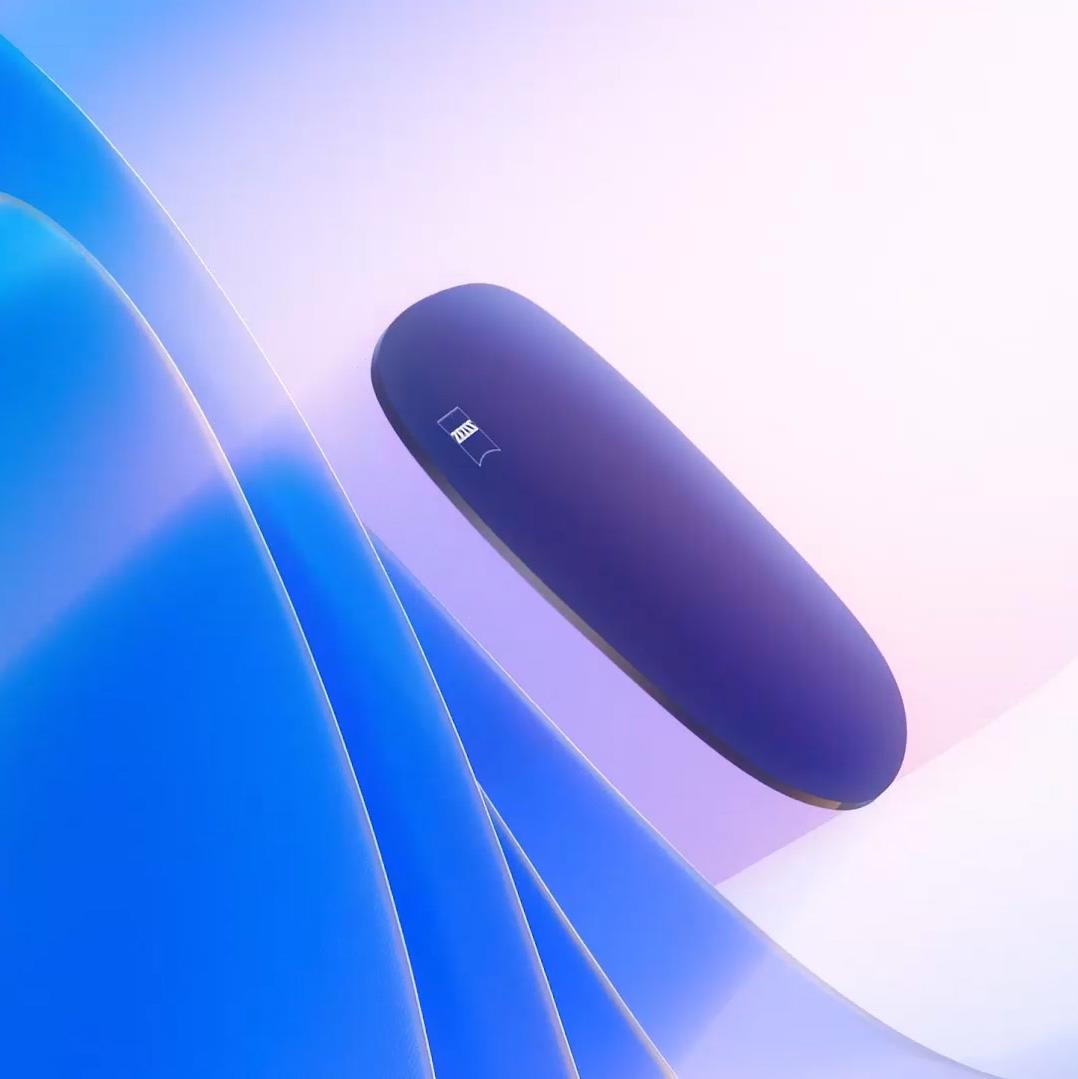 Fényforrás felé úszó színezett lencse 3D CGI illusztrációja, amely hatékonyan blokkolja a káros UV-sugarakat.