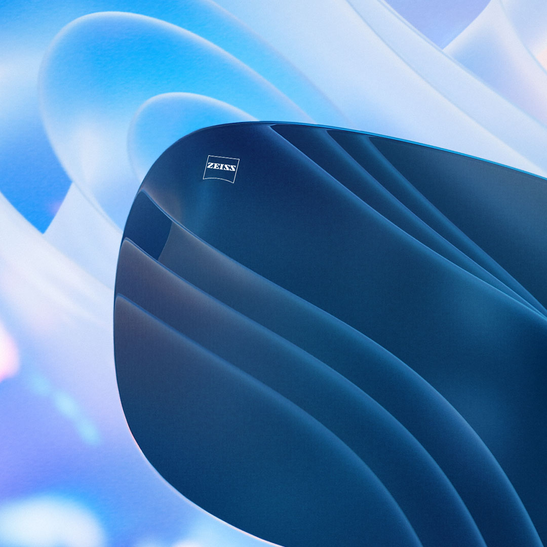 Egy színezett lencse CGI illusztrációja látható, amely hatékonyan blokkolja a háttérben látható vakító fényt.